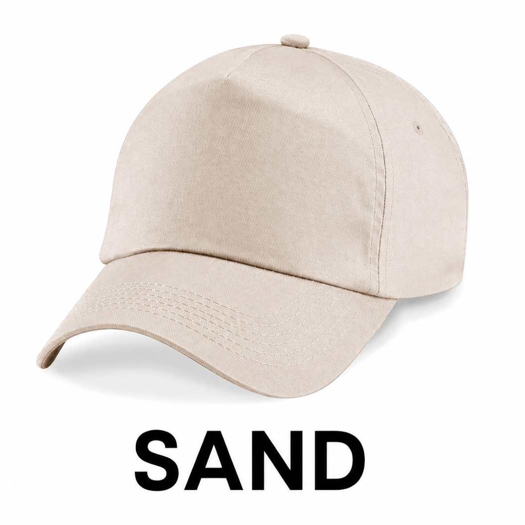 A light sand-colored baseball cap shown on a white background with the word 'SAND' printed below it.